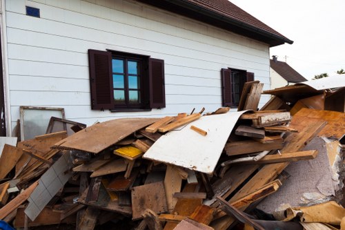 Professional house clearance team in Hainault removing furniture